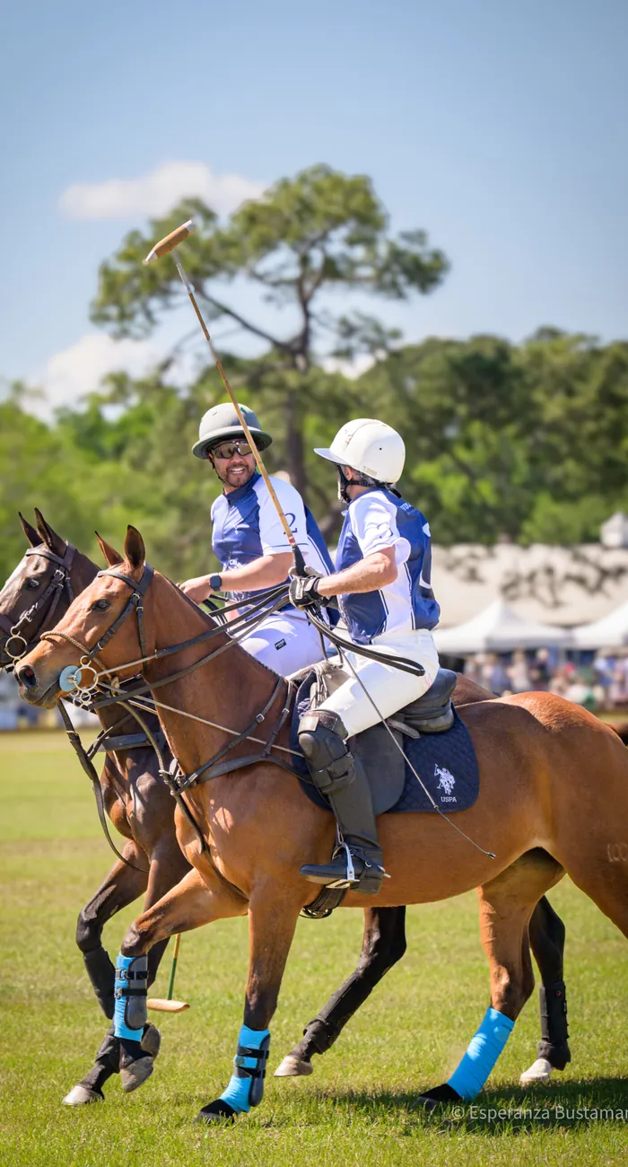 Polo player in blue jersey at the Rose Hill Charity Polo Match