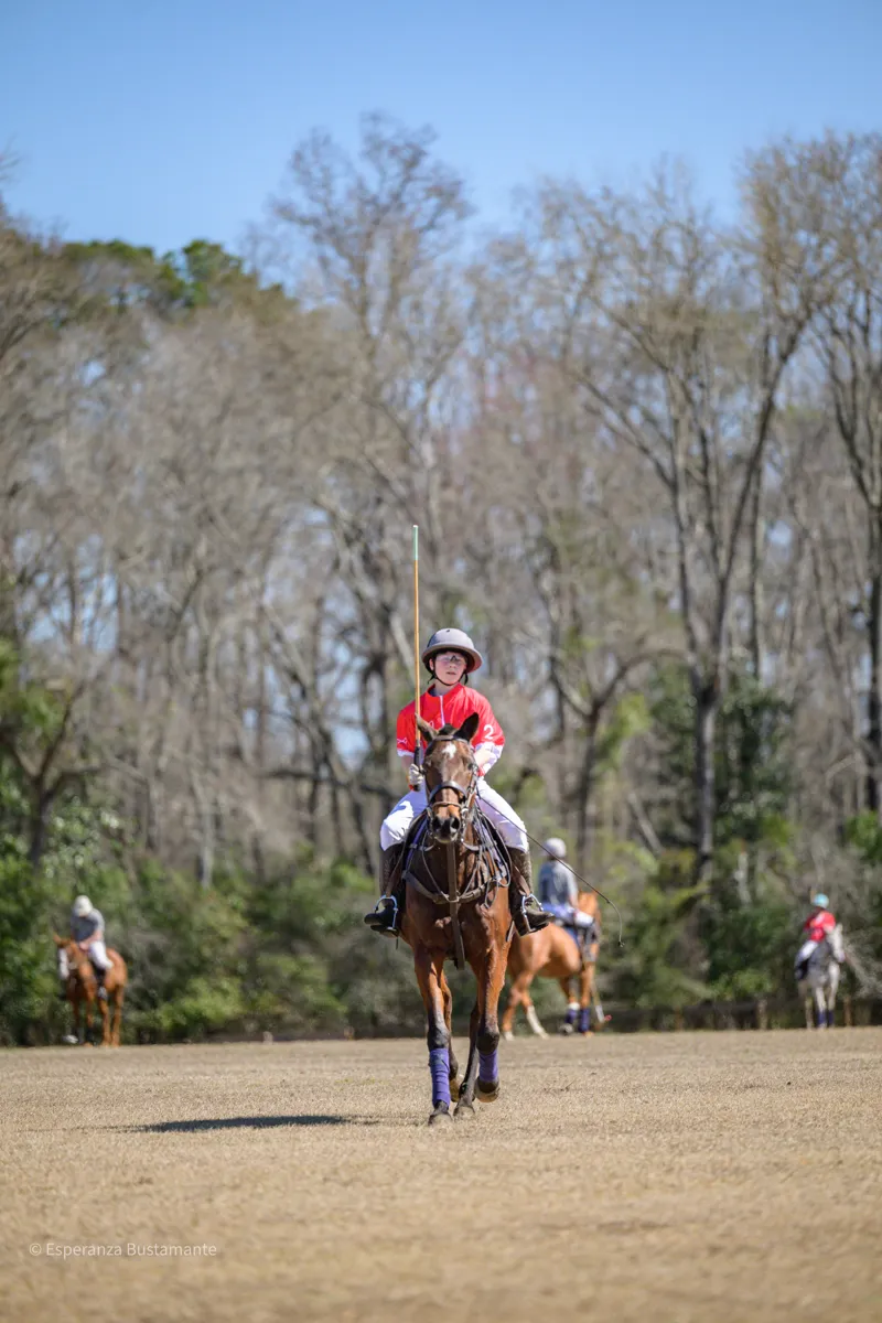 Polo rider charging toward the camera at Rose Hill